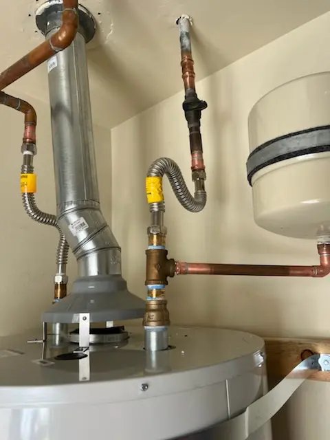Water heater installation and plumbing repair in Summit Village